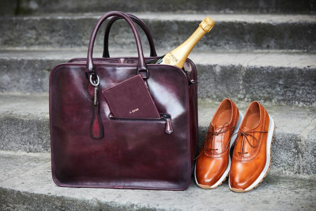 Champagne house Krug and shoemaker Berluti have put their creative minds together to create a masculine tote for your vintage bubbles or luxurious loafers.