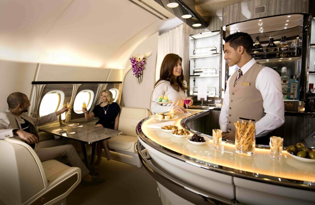 The new Onboard Lounge concept being introduced to Emirates' A380 fleet lets you enjoy happy hour with fellow guests at 39,000ft