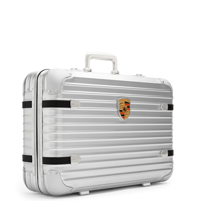 The new limited-edition Rimowa x Porsche Hand-Carry Case Pepita showcases German design at its very best. 