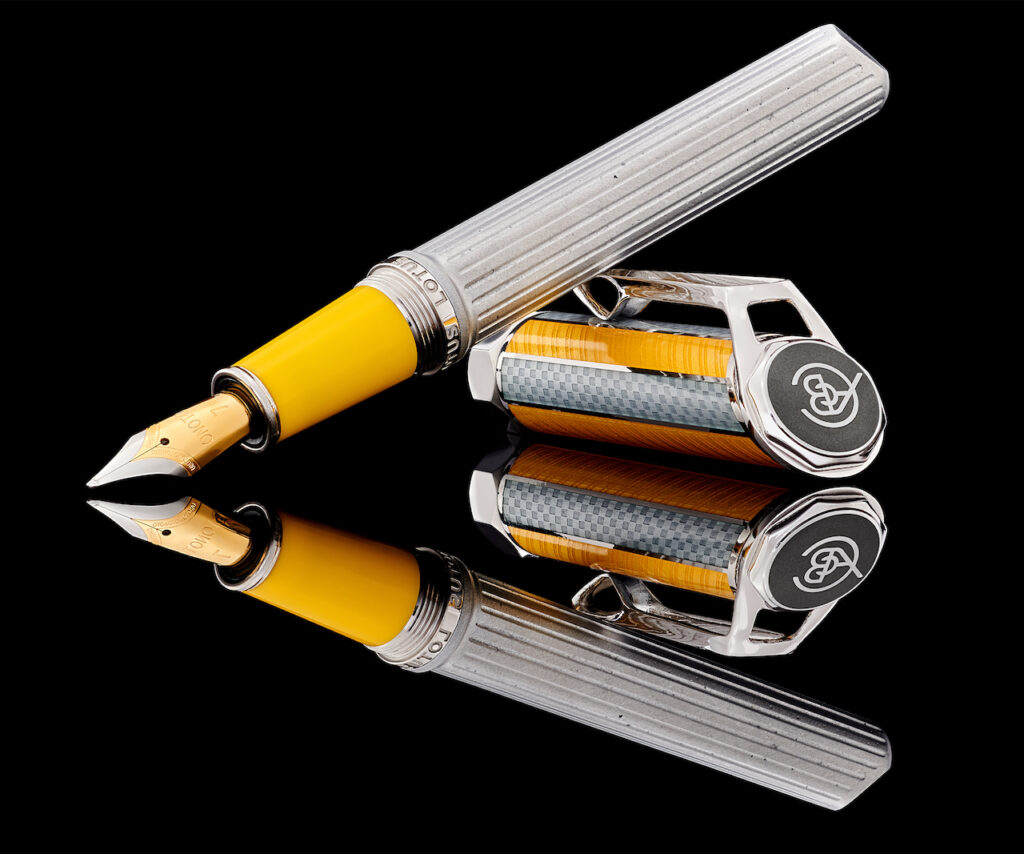 British auto brand Lotus has partnered with few Brit fountain pen icon Onoto to create a striking writing instrument made from F1 cars. 